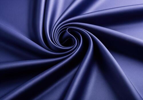 Luxurious deep indigo blue silk fabric swirl with smooth, elegant drapes and folds photo