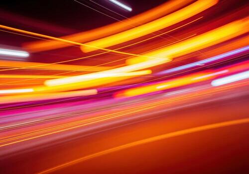 Vibrant abstract light trails with motion blur creating a dynamic burst of warm saturated colors photo
