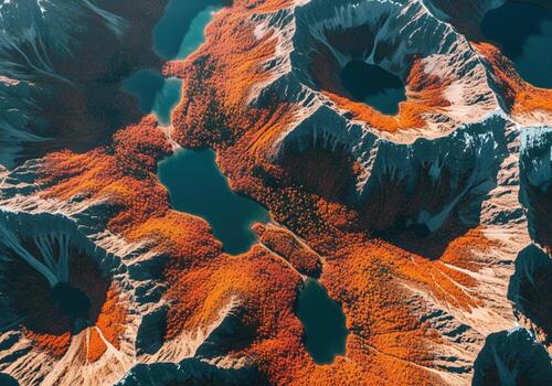 Vast mountain range with vibrant autumn forest and serene alpine lakes, aerial view photo