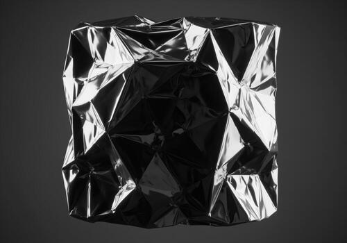 Abstract crumpled metallic silver foil texture with geometric facets and reflections photo