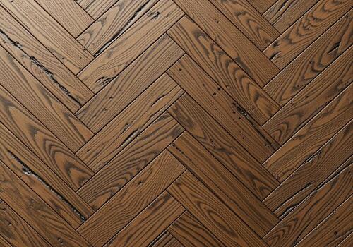 Rich dark oak hardwood flooring with a classic herringbone pattern texture photo