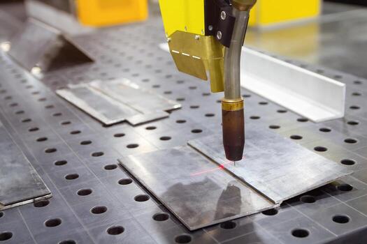 Arc welding robot. Example of working with a laser pointer photo