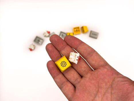 Red switches, Keyboard repair, broken keys, mechanical keyboard, red keycaps, IT, keyboard work advertising, white background, copy space photo