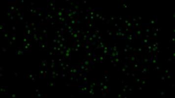 abstrakt lysande grön partiklar flytande i mörker eterisk bokeh bakgrund vetenskap teknologi begrepp digital video
