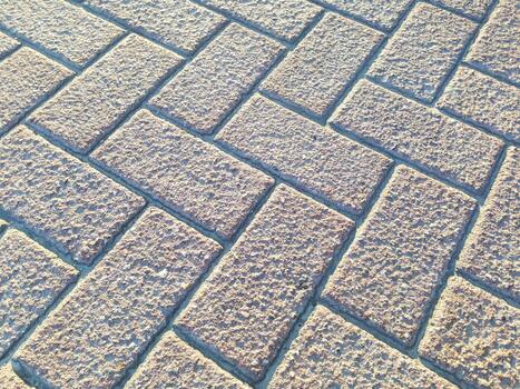 un ladrillo acera con un a cuadros modelo foto