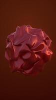 Glossy red abstract shape with smooth curves and organic reflections on a dark background, evoking fluidity and modern design video