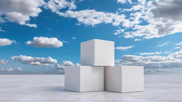 Three white cubes on a white background with blue sky photo