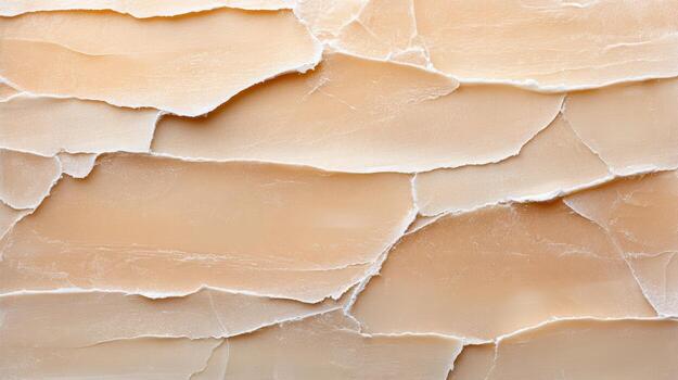 A close up of a cracked wall with some paint on it photo