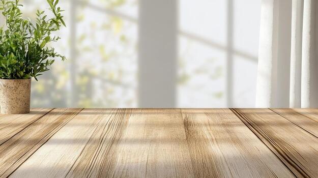 Wooden table with potted plant in front of window photo