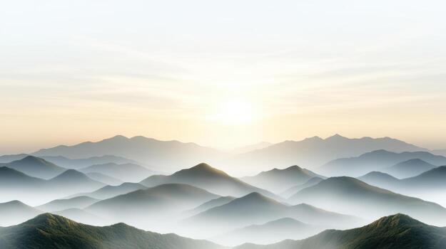 A mountain range with fog and mountains in the background photo