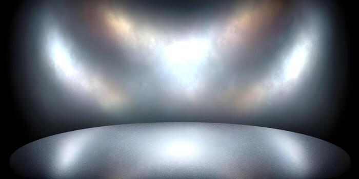 A shimmering stage floor is illuminated by bright spotlights creating a dramatic and abstract background with reflections photo