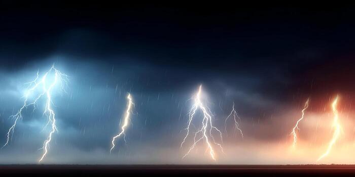 Multiple powerful lightning bolts illuminate a dark stormy sky with heavy rain creating a dramatic blue and orange glow photo