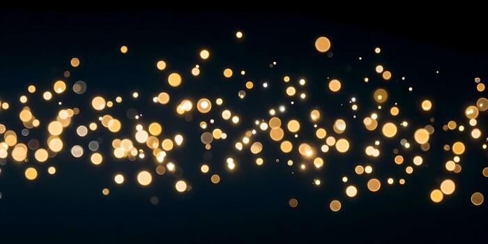 A beautiful array of sparkling golden bokeh lights illuminates a dark abstract background photo