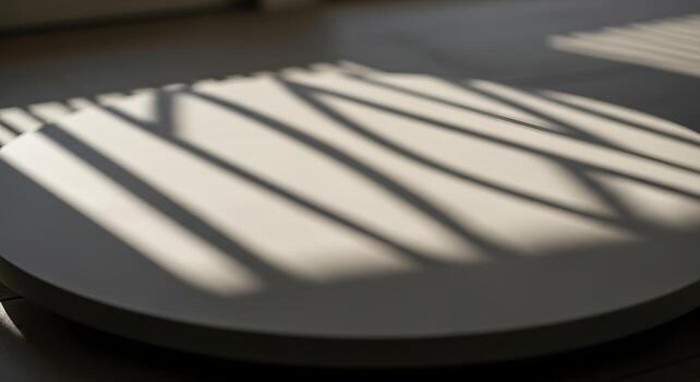 Abstract Shadow Play on a Smooth, Circular Surface A Study in Light and Form photo
