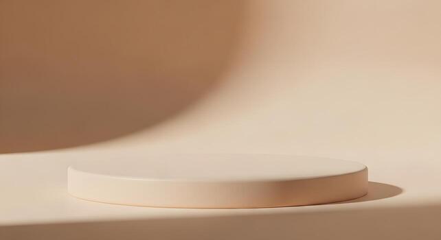 Beige empty pedestal with soft shadow and light, studio background for product display and advertisement photo