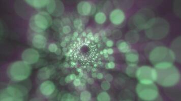 abstrakt lysande tunnel av grön ljus partiklar formning en digital virvel med bokeh djup video