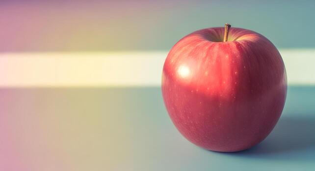 A close-up of a single, ripe red apple with a glossy finish, set against a soft, blurred background with subtle color gradients photo