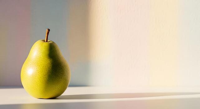 A single, ripe, green pear sits on a white surface, casting a gentle shadow on a pastel-colored wall with soft light and shadow photo