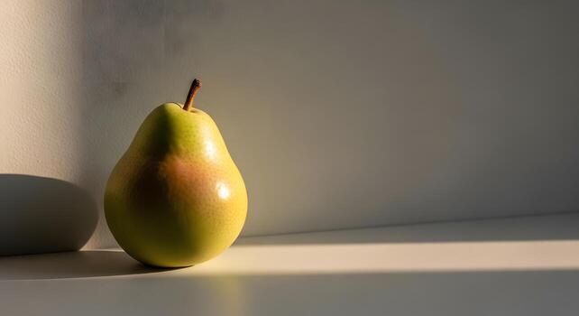 Glowing Pear Still Life Capturing the Essence of Simplicity in Light and Shadow photo