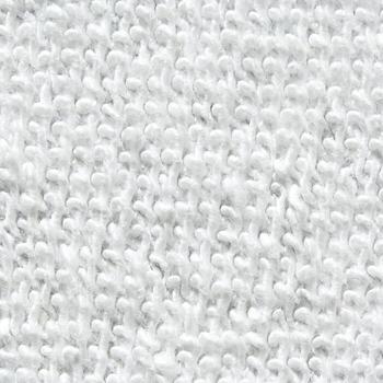 Close-up texture of white terry fabric with soft and fluffy loop pattern in household textile material. photo
