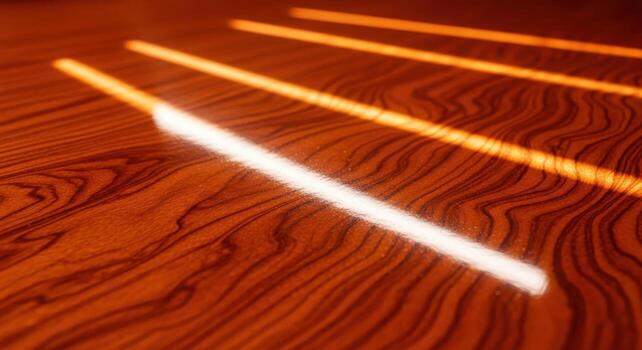 Warm ambient light illuminating polished walnut parquet flooring in a herringbone pattern, highlighting dust particles, with a slight lacquer sheen photo