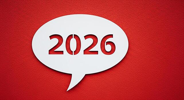 White speech bubble displaying 2026 on a textured red background symbolizing future plans and aspirations with a clean minimalist design and a focus on the upcoming year creating a sense of anticipati photo