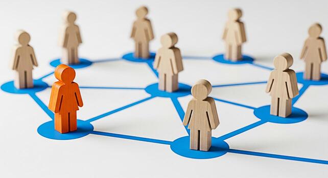 Unique wooden figure standing out in a network of connected figures on a white surface representing individuality leadership and the importance of standing out in a connected world conveying a sense o photo