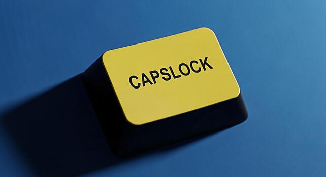 Closeup of a yellow Caps Lock key on a blue keyboard symbolizing the importance of attention to detail and precision in typing and computer use creating a sense of focus and control in a digital envir photo