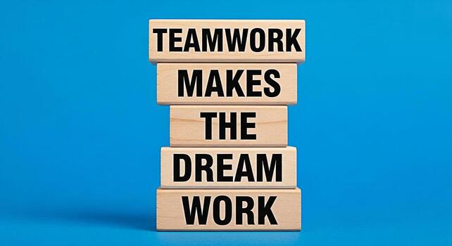 de madera bloques apilado alto en contra un vibrante azul fondo mostrando el motivacional mensaje trabajo en equipo hace el sueño trabajo simbolizando colaboración éxito y el poder de unidad en lograr metas foto