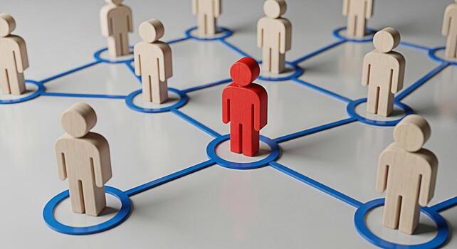 Network of wooden figures connected by blue lines with a red figure standing out symbolizing leadership and connection in a business environment representing a strong and innovative team dynamic photo
