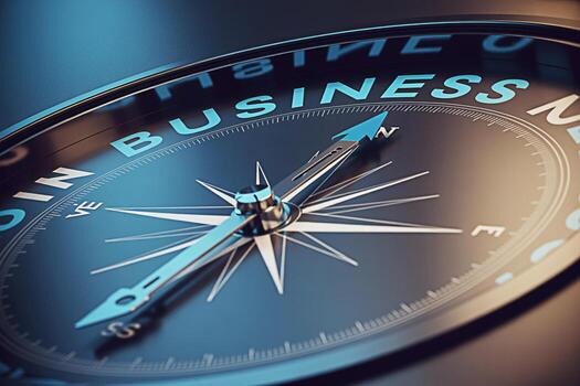 Closeup of a compass pointing towards Business in a corporate environment symbolizing strategic direction navigation and a clear path to success in the competitive business world photo