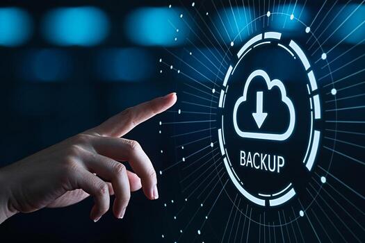 Human hand interacting with a digital interface featuring a cloud icon and the word BACKUP symbolizing data protection and recovery in a modern technologically advanced environment conveying a sense o photo