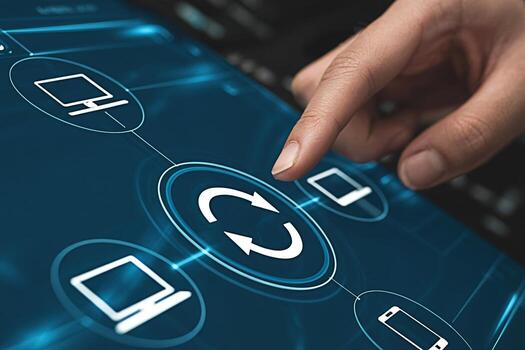 Closeup of a finger touching a digital tablet screen with a refresh icon surrounded by device icons in a modern tech environment representing data synchronization and seamless connectivity photo