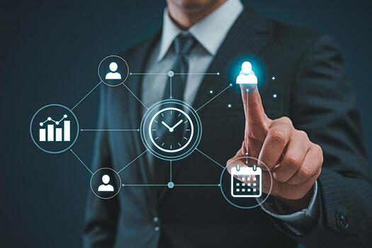Focused businessman in a suit touching a digital interface with icons representing time management scheduling and team collaboration conveying a sense of efficiency and strategic planning in a corpora photo