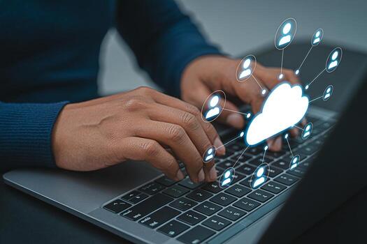 Focused professional using a laptop to access cloud computing services in a modern office symbolizing seamless connectivity and efficient data management for enhanced productivity and collaborative te photo