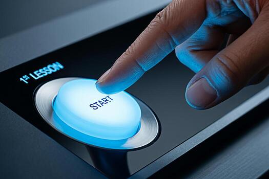 Close-up of a finger pressing a glowing blue start button on a sleek modern device symbolizing the beginning of a new journey first lesson or project with a sense of innovation and technological advan photo