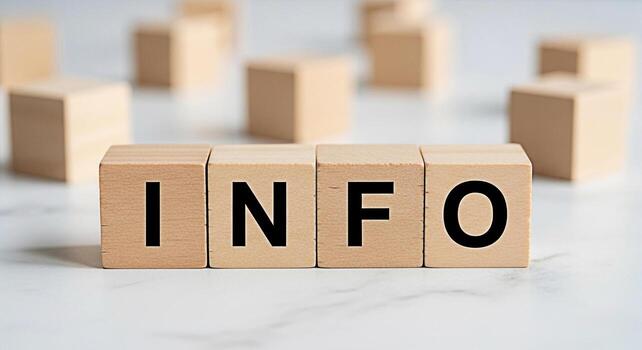 Wooden blocks displaying the word INFO on a clean white surface providing essential information and knowledge in a simple and accessible way promoting clarity and understanding in communication photo