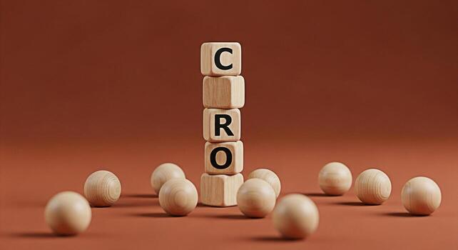 Wooden blocks spelling CRO standing tall on a brown surface surrounded by wooden balls representing Conversion Rate Optimization and the importance of datadriven decisions in a minimalist and conceptu photo