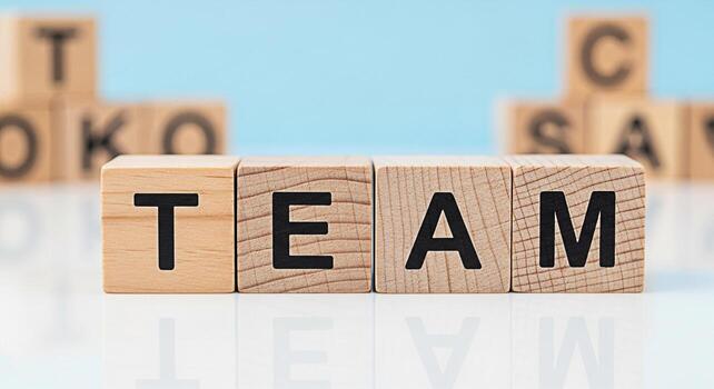 de madera bloques ortografía equipo en un blanco superficie en contra un ligero azul antecedentes simbolizando colaboración unidad y el importancia de trabajo en equipo en lograr común metas con un brillante y optimista mugir foto