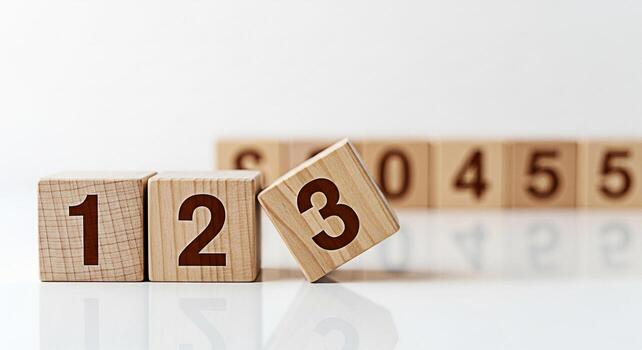 Wooden number blocks displaying numbers 1 2 and 3 on a white surface representing counting learning and early childhood education in a bright and minimalist setting conveying simplicity and clarity photo