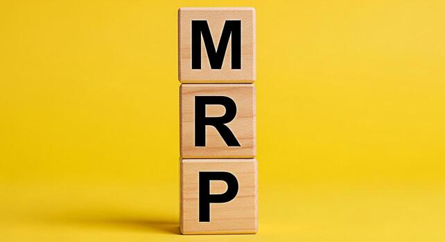 Stack of wooden blocks displaying MRP on a vibrant yellow background symbolizing manufacturing resource planning and efficient business operations conveying a sense of organization and strategic manag photo