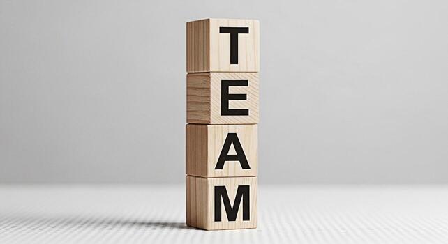 apilado de madera bloques ortografía equipo en un minimalista estudio ajuste simbolizando colaboración unidad y el importancia de trabajo en equipo en lograr común metas Fomentando un sentido de unión y compartido foto