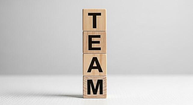 de madera bloques ortografía equipo apilado en un brillante estudio ajuste simbolizando colaboración unidad y el importancia de trabajo en equipo para lograr común metas y Fomentando un apoyo trabajo ambiente foto