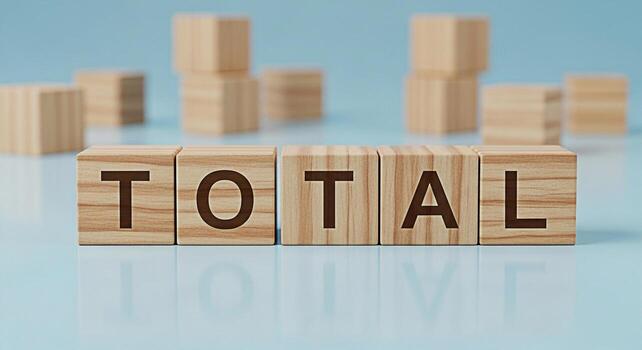 Wooden blocks spelling TOTAL on a reflective surface representing the concept of summing up calculating and achieving a final result set against a clean minimalist blue background conveying clarity an photo