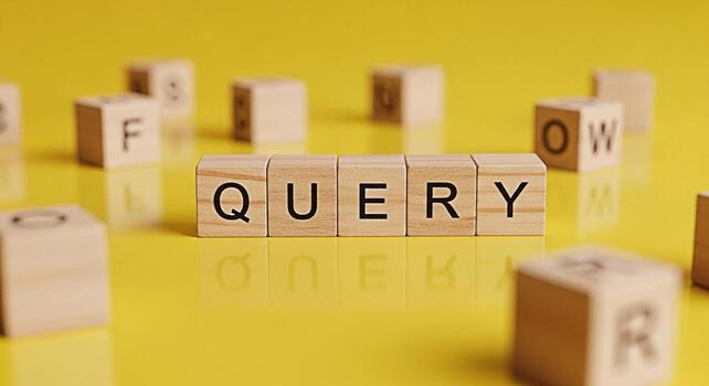 Wooden blocks spelling QUERY on a bright yellow surface representing the concept of searching for information and seeking answers with clarity and focus creating a sense of curiosity and exploration photo