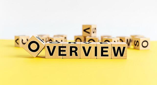 Wooden blocks spelling OVERVIEW arranged on a bright yellow surface presenting a clear and concise summary offering a comprehensive understanding and a sense of clarity and strategic perspective photo