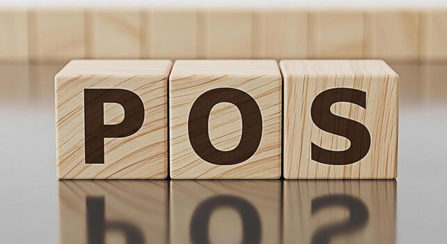 Wooden blocks displaying POS on a reflective surface in a studio setting symbolizing point of sale systems and retail technology conveying a sense of business and commerce with a focus on modern solut photo