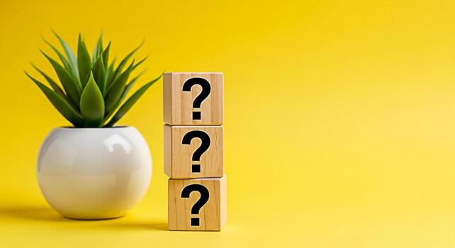 Stack of wooden blocks displaying question marks next to a potted plant against a vibrant yellow background symbolizing uncertainty inquiry and the search for answers in a bright and optimistic settin photo