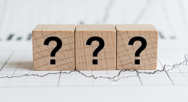 Three wooden blocks displaying question marks resting on a financial chart symbolizing uncertainty in the stock market and the need for strategic decisionmaking in a volatile economic environment conv photo
