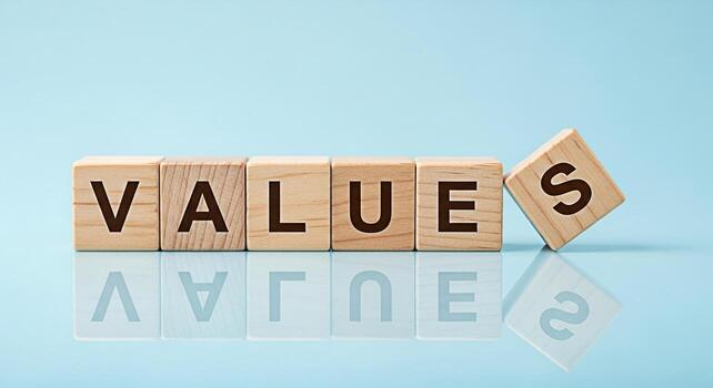 Wooden blocks displaying the word VALUES on a reflective blue surface emphasizing the importance of core principles and ethical standards in business and personal life promoting a sense of trust and i photo